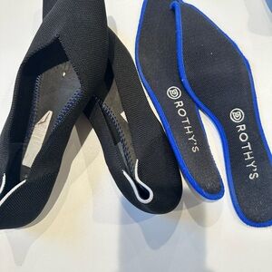 Rothy's Black Flats with Blue and White Accents